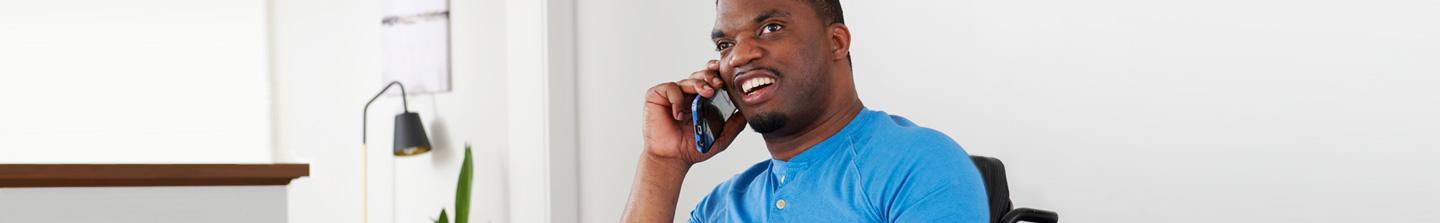 Close up of Black man on his cell phone