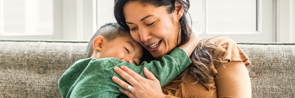mother-and-son-sitting-on-couch